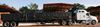 Picture of vinyl steel tarp for for flatbed trucks with 4-foot side drops, from American Tarping.